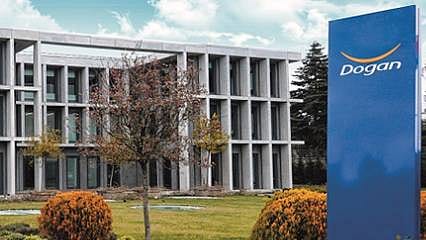Doğan Holding'ten KAP'a 1 satış, 2 satın alma açıklaması