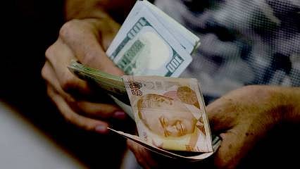 Merkez Bankası anketinde enflasyon tahmini yükseldi, dolar/TL'de düştü 